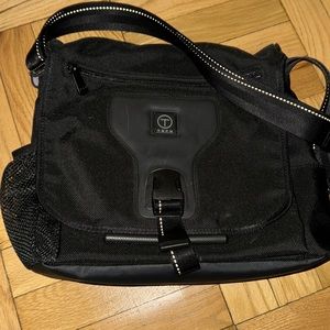 TUMI Tech Black Crossbody Messenger Bag 57035D.  13”wide x 11” long. Like new.